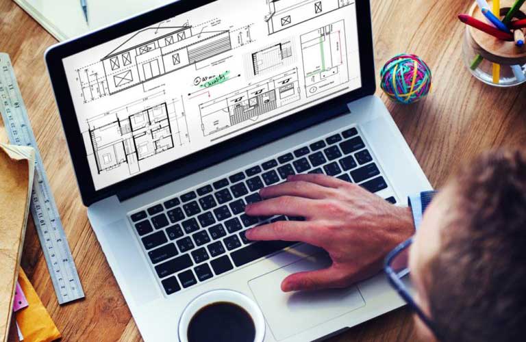 House Plans Being Draften on a Laptop Computer by a Drafting and Design or Renovation Planning Professional